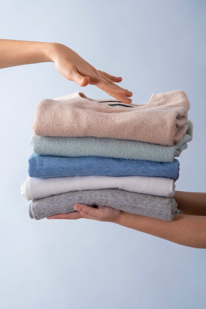 Freshly folded laundry carefully handled by Cleanova